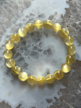 Load image into Gallery viewer, Gold Mica High Grade 9mm Bracelet